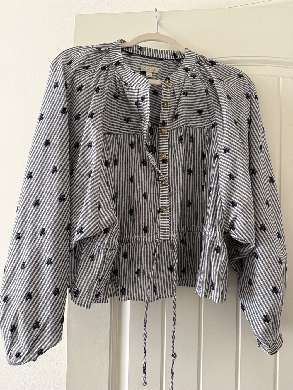 Anthropologie (Pilcro brand) peplum top.